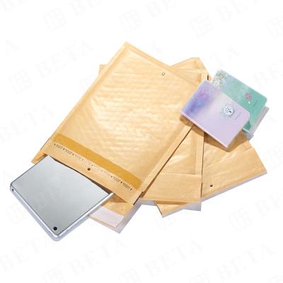 China Custom Self-Seal Mailer Brown Kraft Paper Bubble Envelopes Packaging Bags For Shipping for sale