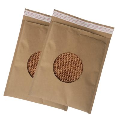 China Biodegradable Eco-friendly Kraft Paper Pure Paper Honeycomb Padded Mailers Bags With Self Seal Strip On Cover Slap for sale