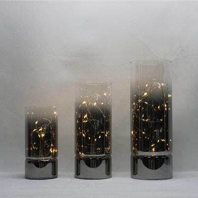 China Fashionable Glass Led Cylinder Light Home Decoration Lamp Changing Smoke Chandelier Gradual Glass With Warm White Light for sale