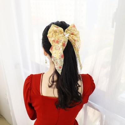 China Comfortable Soft Floral Printed Hair Clip Women Butterfly Hair Clip Fabric Hairpin for sale