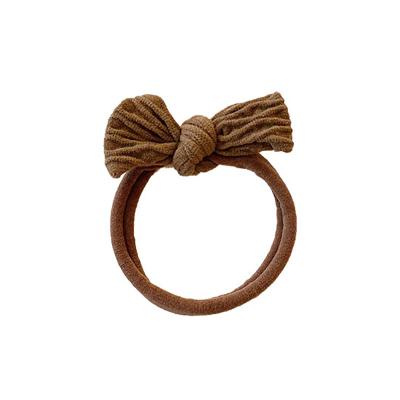 China Cute little coffee color bow hair tie small children's hair rope comfortable elastic band female head tie for sale