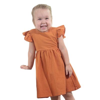 China Anti-wrinkle Girls Dress Baby Cotton Solid Color Canvas Children's Skirt Bow Princess Skirt Fluffy Skirt for sale