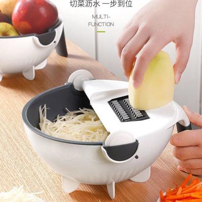 China Stocked 9 in 1 Household Manual Vegetable Grater Round Various Shape Cutting Tool Lazy Kitchen Multifunctional Vegetable Cutter for sale