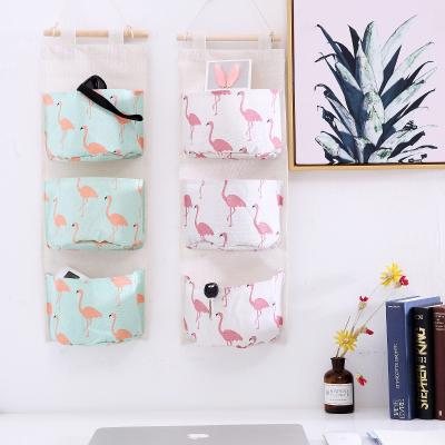 China Traditional Cotton and Hanging Type Multi-Layer Hanging Cloth Art Door Sundries Storage Bag Pocket Canvas Storage for sale