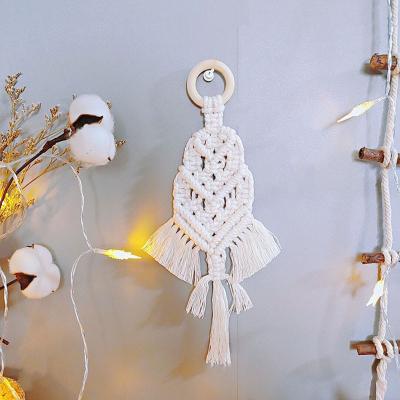 China Minimalist Small Handmade Bedroom Pendant Background Decoration Central Institute of Statistics Nordic Wall Hanging Woven Tassel Jewelry Gift for sale