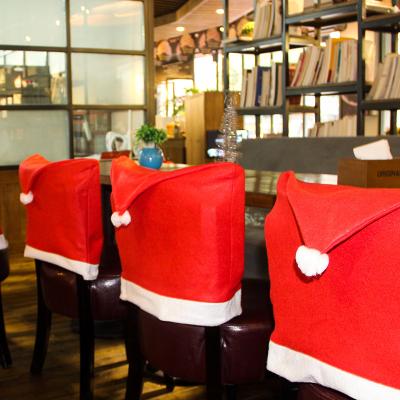 China Simple Christmas Ornaments Christmas Hat Shape Chair Cover Christmas Daily Necessities for sale