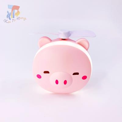 China Wholesale Mini Portable Hand Held Mirror Safety LED Light Supplement Pink Piglet Beauty Fan With USB Charging for sale