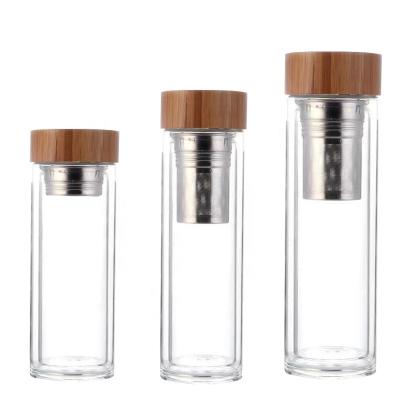 China Viable BPA Free Glass Water Bottle Lids Bamboo Water Bottle With Handle Portable Glass Tea Bottle With Tea Infuser for sale