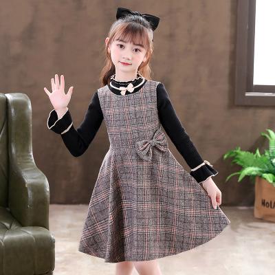 China New autumn and winter girl anti-static luxury custom made plaid skirt with two-piece sweater bow for sale