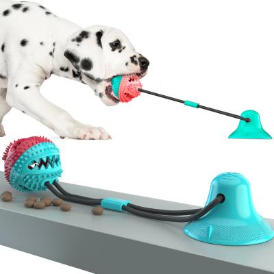 China Stocked Spot wholesale Amazon Hot Sale Molar leakage gnaw Tooth cleaning Sucker toys Bite resistance rubber Bell ball Pet dog toys for sale