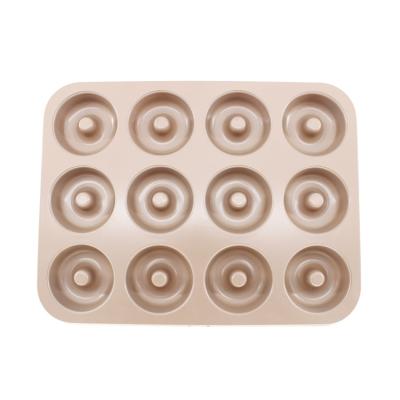 China Nonstick Coating Carbon Steel 0.4mm Eco-Friendly Popular Viable Food Safety Standard Champagne Color 12 Cups Round Donut Cupcake Pan for sale