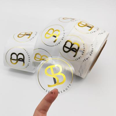 China Easy Peel and Stick Custom Round Label Printing Clear Gold Foil Stamping Stickers for sale