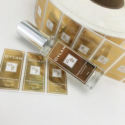 China Custom Cosmetic Adhesive Bottle Waterproof Logo Gold Foil Sticker Perfume Glass Label for sale