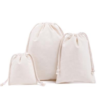 China Various Colors Eco Recyclable 8oz Cotton Drawstring Bags Small Reusable Drawstring Pouch Bags Three Sizes Available for sale