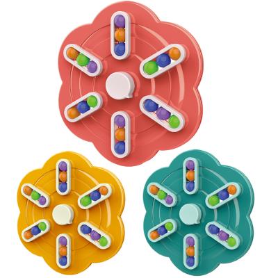 China Educational Stress Release Toys Rotating Magic Finger Spinner Toys Colorful Puzzle Games Stress Reliever Rotating Bean Educational Fidget Puzzle for sale