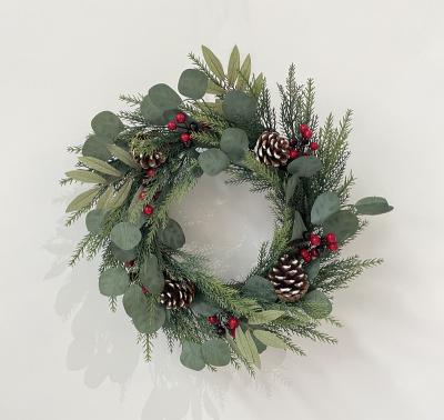 China Christamas Home Decoration Hot Sale Christmas Wreath PVC Red Fruit PE Leaf Decoration Natural Pine Cone Ornaments OEM for sale