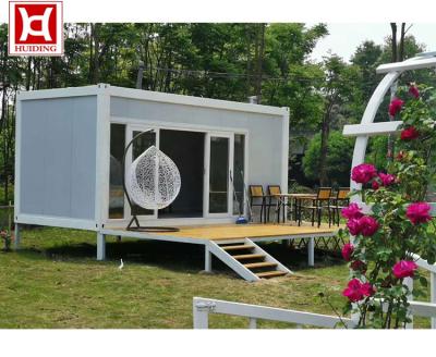 China Modern Function Flat Pack Prefab Shipping Container Frame Glass Housing Building Price for sale