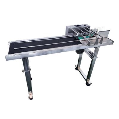 China Automatic Food Feed Coding Plastic Bag Printing Machine Feeder Packaging Machine for sale