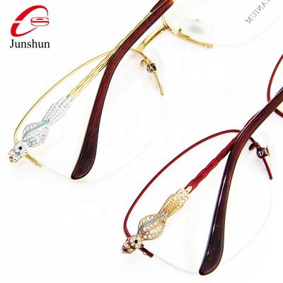 China 15 Years Experience New Arrival Phoenix Diamond Glass Half Frame Luxury Elegant Titanium Fashion Sight Glasses Light Myopia For Women for sale