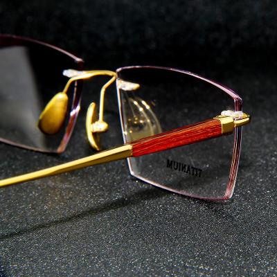 China Eyewear Wooden Titanium Rectangle Designers Optical Reading Glasses Frames 18K Gold Rimless Glasses Comfortable for sale