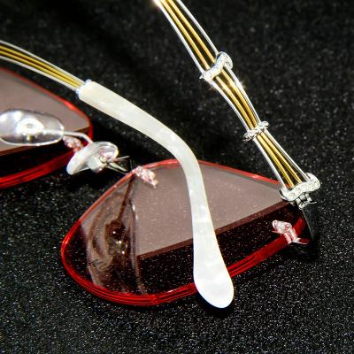 China Comfortable Optical Titanium Acuvue Brillen Diamond Cutting Rimless Glasses No Prescription For Women Lady for sale