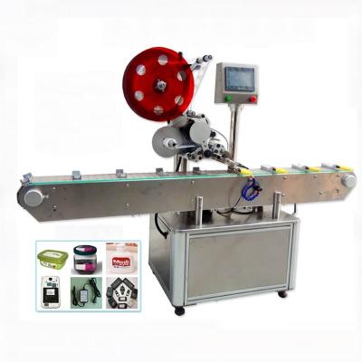 China Automatic Food Book Flat Boxes Plastic Pouch Bag Labeling Machines For Cosmetics Stand Up Pouches Labeler for sale