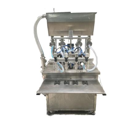 China Semi Automatic Beverage 4 Spout Filling Paste And Liquid Oil Filling Machine for sale