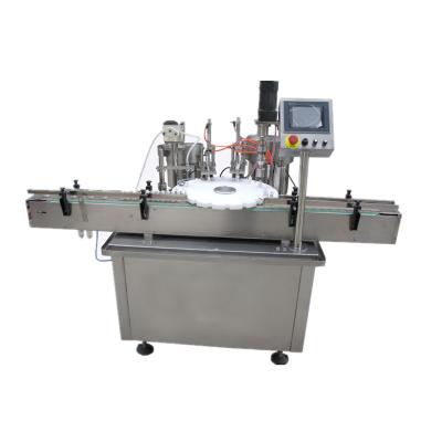 China Chinese beverage factory produces automatic small round bottle filling and capping machine liquid filling machine for sale