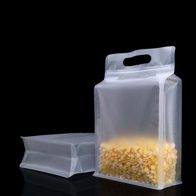 China Flat Bottom Pouch Grains Moisture Proof Frosted Rice Packaging Ziplock Plastic Bag With Handle for sale