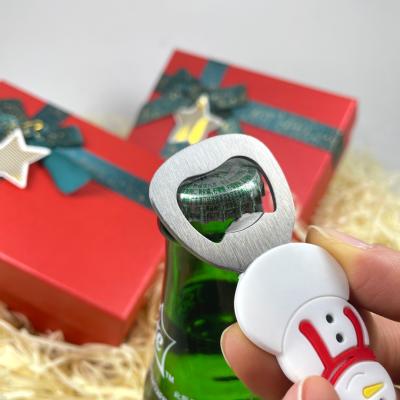 China Innovative GIFT OPENER Ideas 2022 New Product Metal Plastic Snowman Christmas Gift Beer Bottle Opener for sale