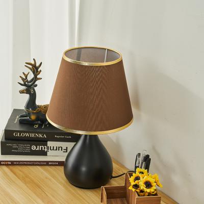 China Modern Iron Special Body Lampshade Fabric Design Switch Office Night Inductive Table Lamp for sale