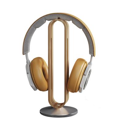 China Universal Flexible U Shaped Console Bamboo Earphone Stand Earphone Aluminum Alloy Base for sale