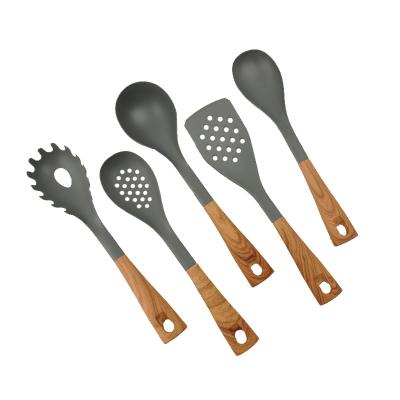 China Sustainable Nonstick Kitchen Tools Nylon Cookware Set With Wood Coating Handle for sale