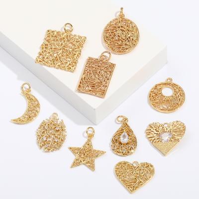 China FASHIONABLE Free Custom Gold Plated Hollow Jewelry Heart Moon Round Pendant Charms For Jewelry Making for sale