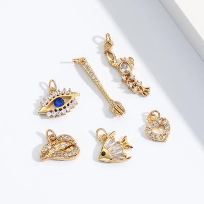 China FASHIONABLE Tiny Cute Gold Plated Heart Pendant Crystal Pendant Mini Horus Eyes Charms Jewelry Pendants Making Set for sale