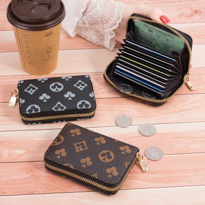 China PU Leather Key PU Card Holder Short-section Multi-position Multi-position Organ Card Women's Cowhide Credit Card Bag 2022 for sale