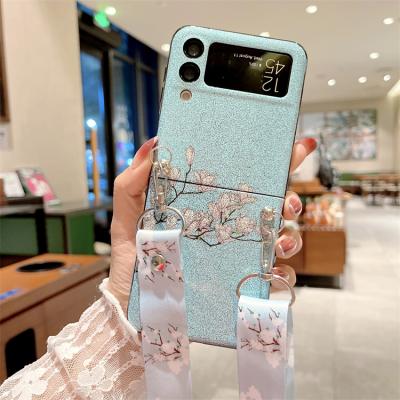 China Fashion Galaxy 5g shockproof japanese korean case for samsung galaxy z flip3 zflip3 simple flower design pu cell phone case with strap for sale