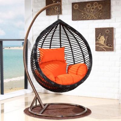 China Outdoor Modern Patio Rattan Egg Balcony Wicker Stand Shaped Hanging Swing Chair With Cushion for sale