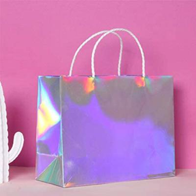 China Business Promotion Rainbow Laser Hologram Recyclable Matte Coated Gift Paper Bag Customized Holographic Luster With Bow For Eyelash Makeup for sale