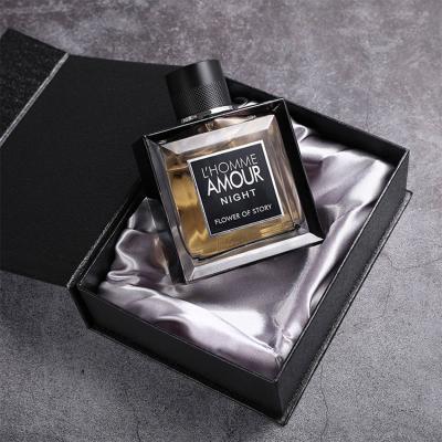 China Recyclable custom gold carbroad foldable packaging boxes and black luxury small package perfume bottle gift wrap magnet magnetic door for sale