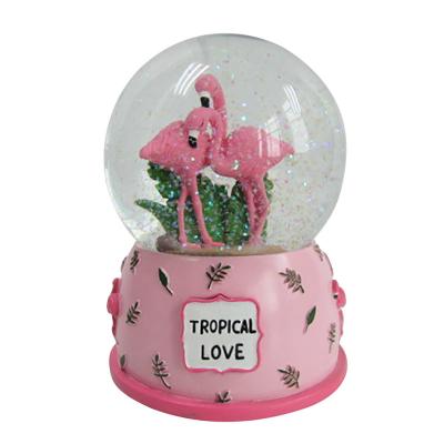 China Europe Valentine Souvenir Glitter Water Ball Resin Flamingo Snow Globe for sale