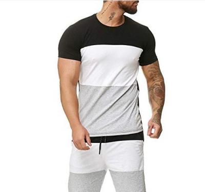 China New Breathable Plus Size Patchwork Sleeve Stitching Fitness Running Sports Short Set 2 Piece Men's Shorts Suit Tracksuit for sale