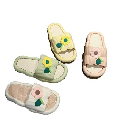 China Trend 2023 fashion spring and summer new progression on a sense of female home leisure excrement flower simple flat slippers cute flip-flops for sale