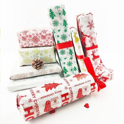 China Wholesale Disposable Stock Christmas Tissue Paper Christmas Wrapping Paper Merry Christmas Gift Wrapping Paper for sale