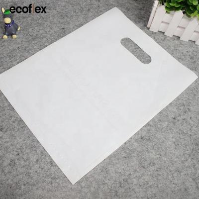 China Custom Logo BIODEGRADABLE Eco Friendly Plastic T-shirt Clothing Packaging Bags for sale