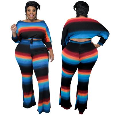 China 2022 Plus Size Women Breathable Apparel Long Sleeve Crop Top And Flare Pants Set Stripes Printed Womens Pants Two Piece Set for sale