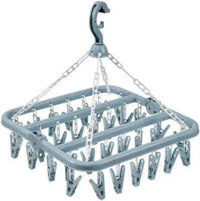 China High Quality Clothes Drying Hanger With 32 Clips And Drips Foldable Hanging Rack (Light Blue) for sale