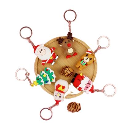 China Santa Claus Snowman Elk Cartoon PVC Key Chain High Quality Christmas Soft Glue Pendant For Christmas Decoration for sale