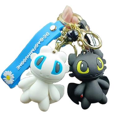 China High Quality Cartoon Cute Doll Flying Dragon Key Chain Pendant Night Ghost Light Ghost Couple Bag Glue Pendant Dripping Key Chain for sale