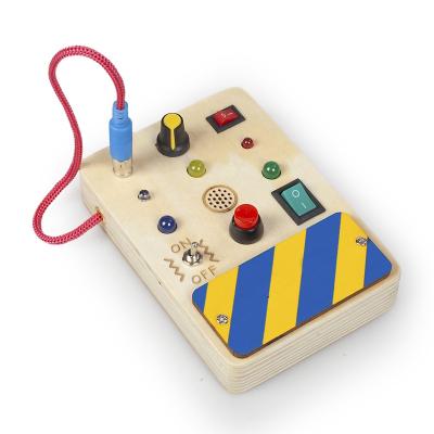 China Wooden Activity LED Light Toy Switch Box Kids Sensory Busy Board Baby Busy Board Toy for sale